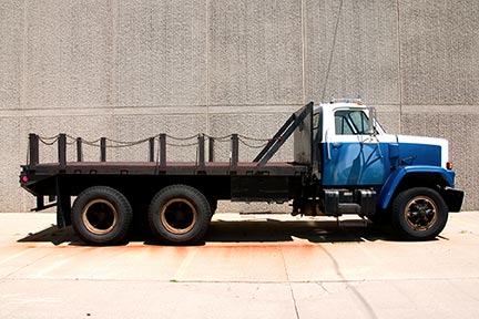 Flatbed straight truck - contact a Lancaster Straight Truck Accident Attorney if you have been involved in an accident with a straight truck.